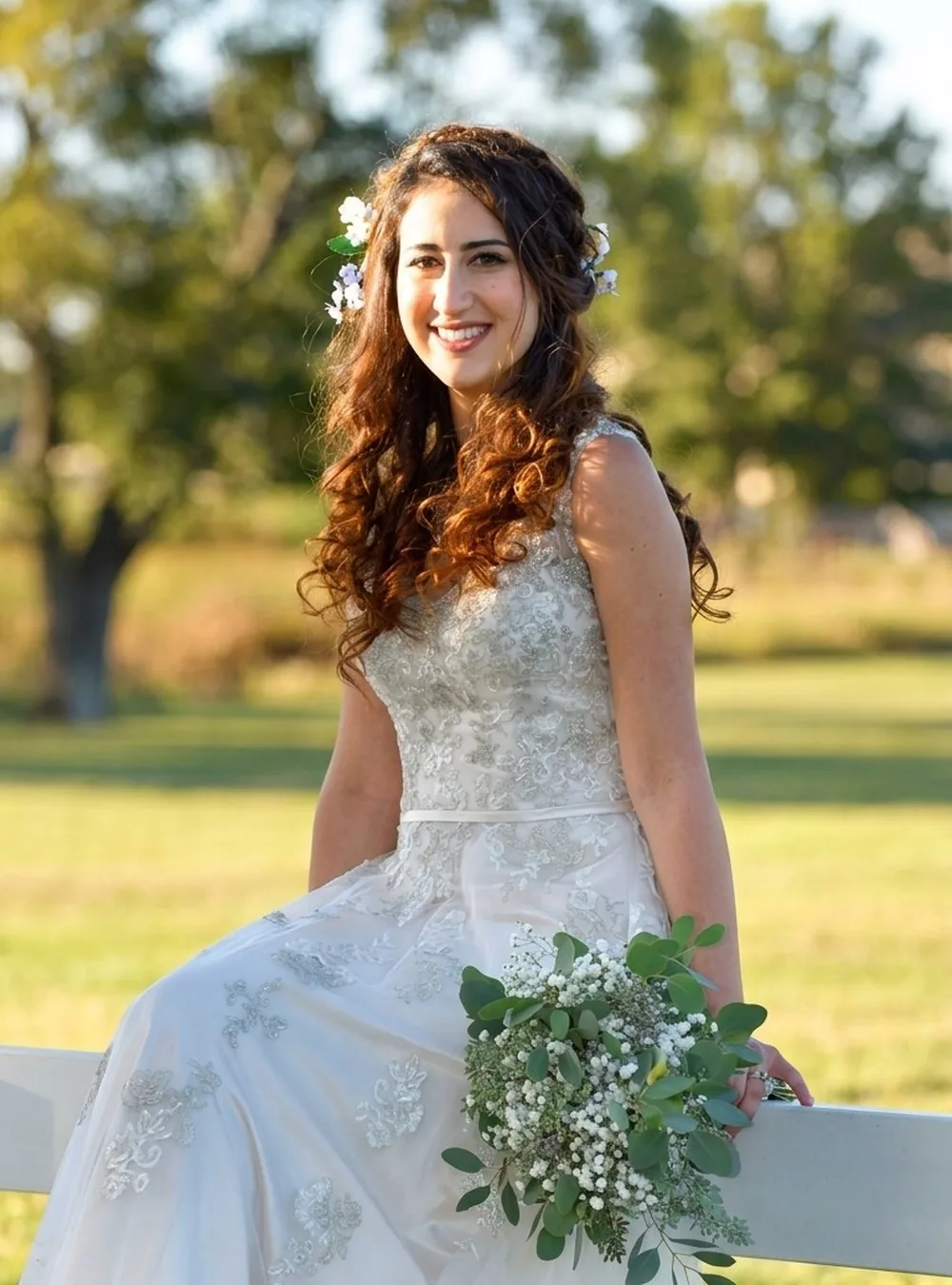 Bride in a white lace gown, hair and makeup by Bridal Art Studio